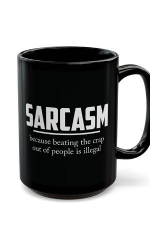 A black ceramic mug with bold white text that reads: "Sarcasm – because beating the crap out of people is illegal."