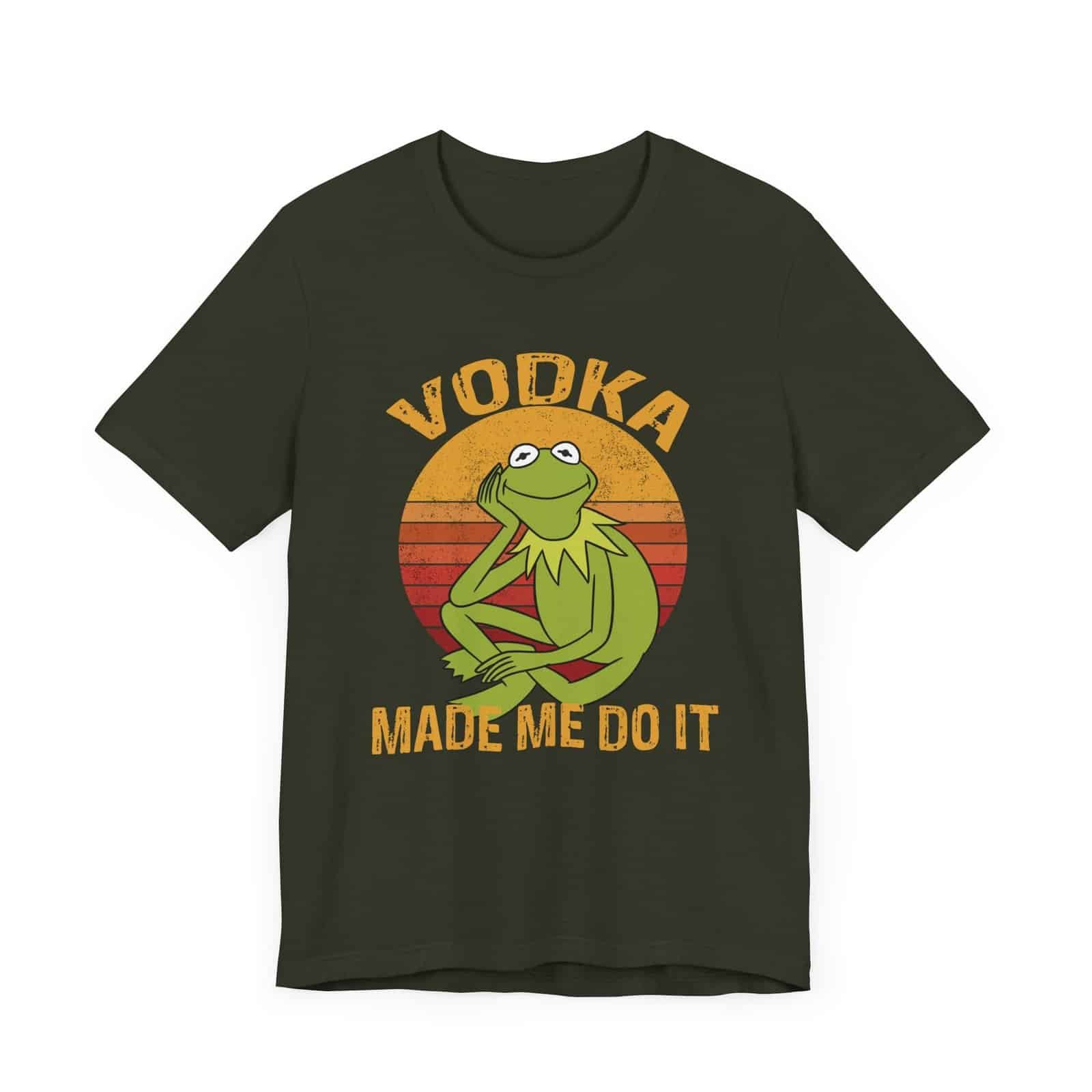 A dark-colored t-shirt featuring a retro-style design with a relaxed green frog and the phrase 'Vodka Made Me Do It'."